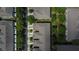 Aerial view showcases the townhome community layout with private driveways and mature trees at 2119 Kings Palace Dr, Riverview, FL 33578