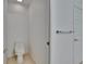 Bathroom featuring toilet, tile floor, and towel bar at 2119 Kings Palace Dr, Riverview, FL 33578