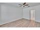 Bedroom with wood-look flooring with a ceiling fan at 2119 Kings Palace Dr, Riverview, FL 33578