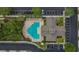 Aerial view showcasing a pristine community pool and the meticulously maintained grounds surrounding it at 2119 Kings Palace Dr, Riverview, FL 33578