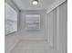 Bright dining area with tile flooring, windows, and sliding glass doors at 2119 Kings Palace Dr, Riverview, FL 33578