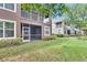 Exterior view showing patio and landscaped yard at 2119 Kings Palace Dr, Riverview, FL 33578