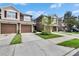Attached garages and landscaped lawns define the exterior of these charming townhomes at 2119 Kings Palace Dr, Riverview, FL 33578