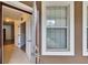 A view of the foyer with tile flooring and an open doorway at 2119 Kings Palace Dr, Riverview, FL 33578