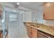A kitchen featuring an eat-in area with a peninsula, granite counters, and stainless appliances at 2119 Kings Palace Dr, Riverview, FL 33578