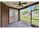 View from screened patio to grass and landscaped yard at 2119 Kings Palace Dr, Riverview, FL 33578