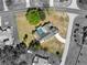 Aerial view of the property featuring a private pool at 2449 Running Oak Ct, Spring Hill, FL 34608