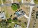 Aerial view of the property featuring a private pool at 2449 Running Oak Ct, Spring Hill, FL 34608