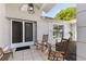 Welcoming front porch with rocking chairs, creating a cozy and inviting entrance to the home at 2449 Running Oak Ct, Spring Hill, FL 34608