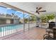 Covered patio with view of screened-in pool and a ceiling fan at 2449 Running Oak Ct, Spring Hill, FL 34608