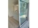 Poolside bar area with view of the pool through large glass slider at 2449 Running Oak Ct, Spring Hill, FL 34608