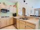 Spacious kitchen featuring stainless appliances and ample counter space at 28402 Openfield Loop, Wesley Chapel, FL 33543