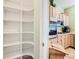The kitchen features stainless appliances and lots of storage at 28402 Openfield Loop, Wesley Chapel, FL 33543