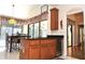 Kitchen with granite countertops, stainless steel appliances, and a breakfast nook with backyard views at 3189 Roxmere Dr, Palm Harbor, FL 34685