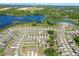 Aerial view of the community with beautiful ponds and well-placed homes at 36541 Night Strawberry Ct, Dade City, FL 33525