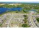 Aerial view of a Primary-planned community with lakes and lush landscaping at 36541 Night Strawberry Ct, Dade City, FL 33525