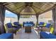 Outdoor gazebo with comfortable seating, perfect for relaxing or entertaining guests at 36541 Night Strawberry Ct, Dade City, FL 33525