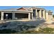 Under construction; the front exterior features a garage and a modern entrance with large windows at 440 Green Dolphin S Dr, Placida, FL 33946