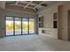 Spacious living room under construction with large windows and modern architectural details at 440 Green Dolphin S Dr, Placida, FL 33946