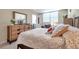 This bedroom with warm, neutral tones boasts lots of natural light and comfortable styling at 4720 Locust Ne St # 206, St Petersburg, FL 33703