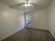 Bedroom with a window that lets in natural light and a ceiling fan for comfort at 4731 Portobello Cir, Valrico, FL 33596
