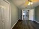 Bedroom features hardwood floors, ample closet space, and a ceiling fan for added comfort at 4731 Portobello Cir, Valrico, FL 33596