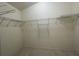 Walk-in closet with wire shelving to help maximize space and stay organized at 4731 Portobello Cir, Valrico, FL 33596