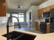 Modern kitchen featuring stainless steel appliances, light countertops, and natural lighting at 4731 Portobello Cir, Valrico, FL 33596