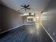 Large living room open to the kitchen area, perfect for modern living and entertaining at 4731 Portobello Cir, Valrico, FL 33596