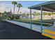 Organized shuffleboard courts featuring covered seating for spectators and players alike, ideal for community gatherings at 4851 W Gandy Blvd # B2L11, Tampa, FL 33611
