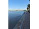 Scenic waterfront view with beach access and walking path, perfect for enjoying the natural beauty of the community at 4851 W Gandy Blvd # B2L11, Tampa, FL 33611