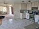 Outdated kitchen with stainless steel appliances needing some repair at 613 Chestnut St, Oldsmar, FL 34677