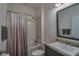 Well-lit bathroom with shower-tub, granite vanity, and brushed nickel fixtures at 6312 Lantern View Pl, Apollo Beach, FL 33572