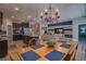 Spacious kitchen with granite counters and island open to the living and dining areas at 6312 Lantern View Pl, Apollo Beach, FL 33572