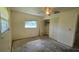 Bedroom with closet, window, and ceiling fan at 704 Lemonwood Dr, Oldsmar, FL 34677