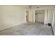 Spacious bedroom with closet space and access to the ensuite bathroom at 704 Lemonwood Dr, Oldsmar, FL 34677