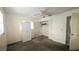 The bedroom includes a closet, ceiling fan and windows at 704 Lemonwood Dr, Oldsmar, FL 34677