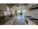 Functional kitchen with laminate countertops and appliances at 704 Lemonwood Dr, Oldsmar, FL 34677