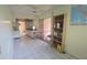 Kitchen area featuring essential appliances, ample counter space and view to adjacent rooms at 704 Lemonwood Dr, Oldsmar, FL 34677