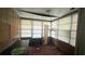 The sun room with natural light could be used for office or storage at 704 Lemonwood Dr, Oldsmar, FL 34677