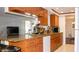 Open kitchen featuring updated appliances, breakfast bar, and eat-in nook at 7321 San Moritz Dr, Port Richey, FL 34668