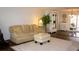 Comfortable living area featuring a plush sofa, white shag rug, and a bright, open layout at 7321 San Moritz Dr, Port Richey, FL 34668