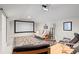 Cozy movie room with a large screen, comfortable seating, and projector for entertainment at 7775 Still Lakes Dr, Odessa, FL 33556