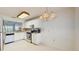 Updated kitchen featuring granite countertops, stylish backsplash, and stainless steel appliances at 7802 Hardwick Dr # 1126, New Port Richey, FL 34653
