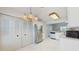 Bright kitchen with ample storage, stainless steel refrigerator, and modern appliances at 7802 Hardwick Dr # 1126, New Port Richey, FL 34653