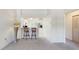 Inviting living space with views of the breakfast bar and kitchen at 7802 Hardwick Dr # 1126, New Port Richey, FL 34653