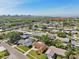 Aerial view of the property showing the surrounding neighborhood and waterfront at 8408 Flagstone Dr, Tampa, FL 33615