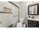 Modern bathroom features tiled shower and a dark vanity at 8408 Flagstone Dr, Tampa, FL 33615