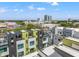Aerial view of townhomes offering rooftop terraces and views of the city skyline at 907 Arlington N Ave, St Petersburg, FL 33705