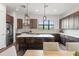 Stylish kitchen features a large island, stainless steel appliances, and sleek cabinetry at 907 Arlington N Ave, St Petersburg, FL 33705